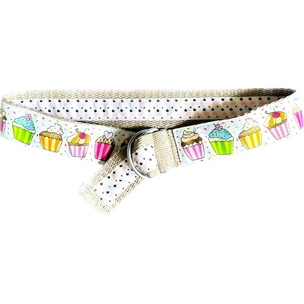 Belt, cupcakes and reverses to hearts on backside Celebrate in style.Adjustable